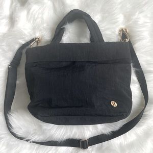 Lululemon On My Level Micro bag. With tag but not attached. Black/gold